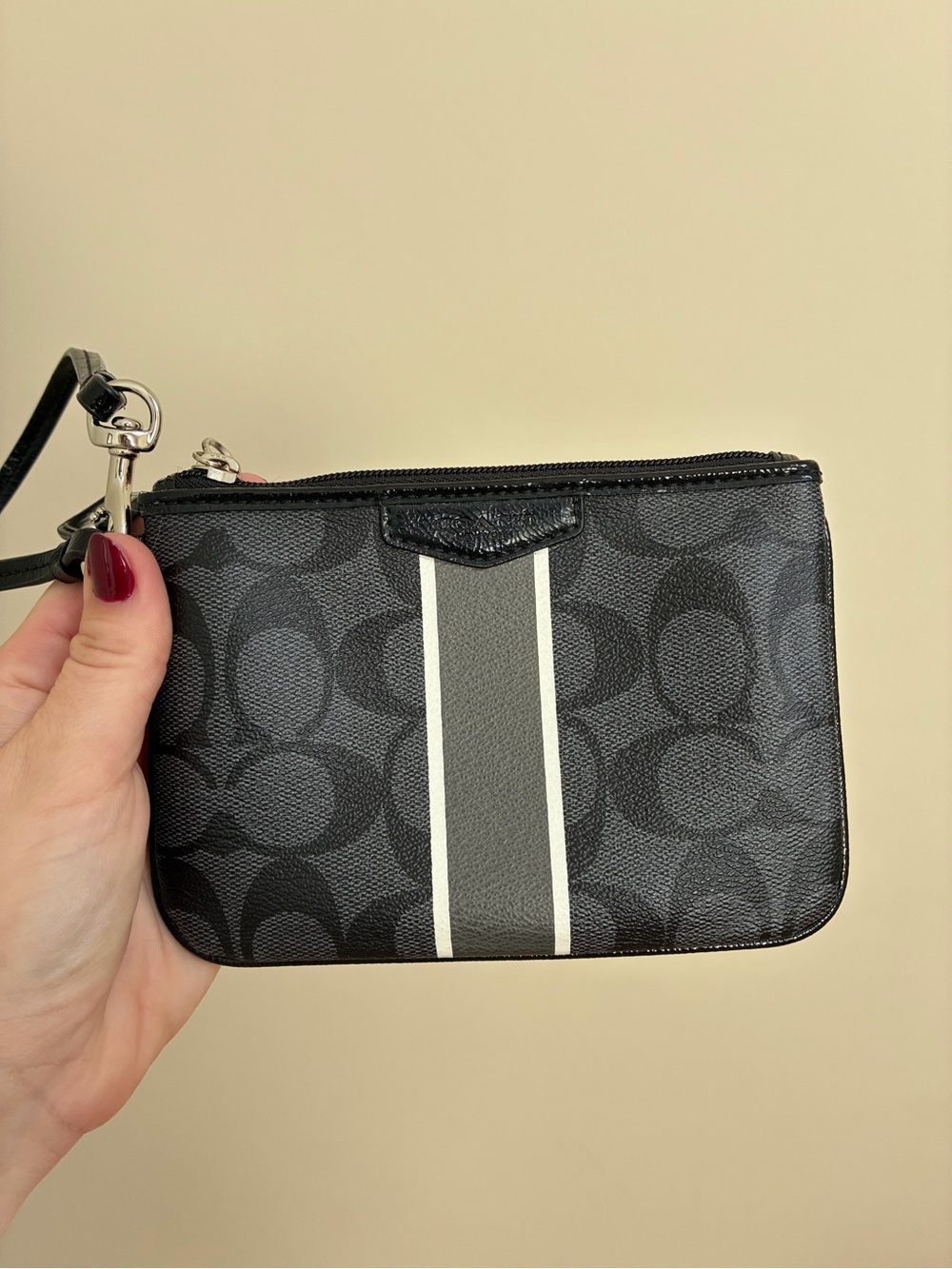COACH Corner Zip Wristlet in Black Leather with Signature C Logo Stripe